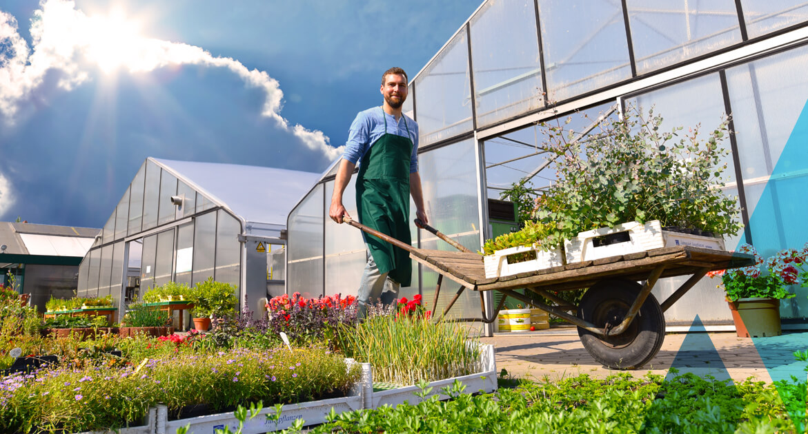 Farmer outside of greenhouse